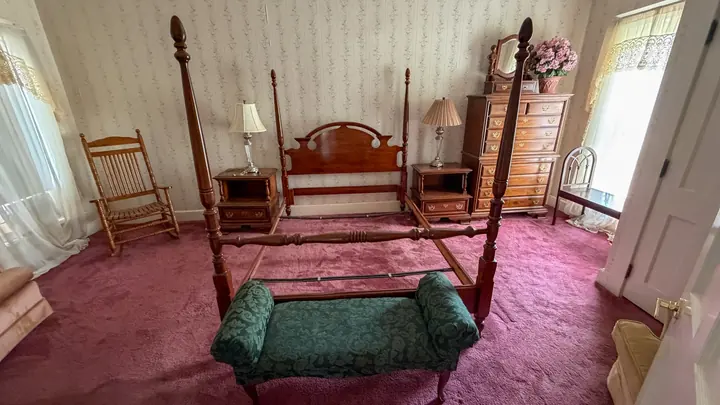 Spacious bedroom with vintage character.